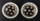 A pair of navy buttons decorated with rose buds and gilt detail
