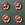 A set of four buttons decorated with foxes heads