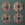 Metal and stone buttons in three different colours, blue red and greenuors 